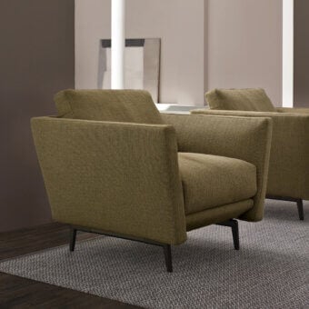 Distinctive CTS Salotti Urban Lounge chair in muted olive green textile upholstery with sleek aluminum feet