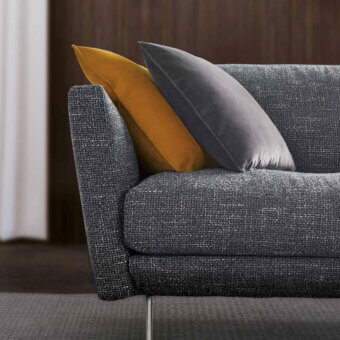 Elegant CTS Salotti Urban sofa upholstered in textured dark gray textile with sleek silver-toned aluminum legs and a golden yellow cushion