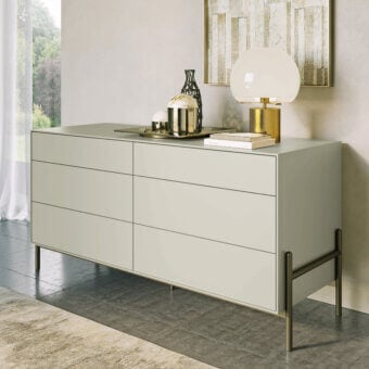 Exceptional Dallagnese Supernova dresser with linear drawers and a matte sage green finish built with painted metal and brass tone base