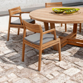 Superior Ethimo Costes armchair with FSC-certified teak structure and subtly textured gray cushion for comfortable seating