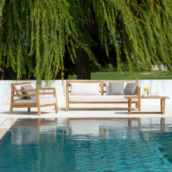 Exceptional Ethimo Costes sofa crafted with FSC-certified teak and light gray cushions in a distinctive pickled finish