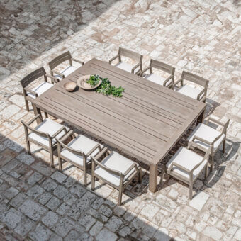 Superior Ethimo Costes table crafted in FSC-certified natural teak with a pickled finish and slatted top