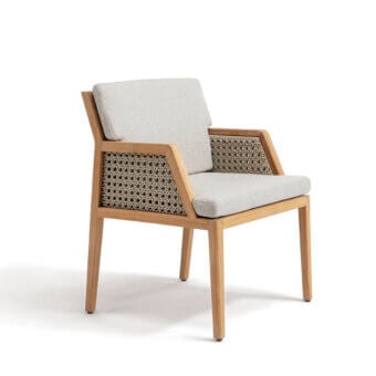 Exceptional Ethimo Grand Life armchair crafted in Italy with warm wood and refined woven beige textile cushions