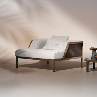Distinguished Ethimo Grand Life lounge chair with woven texture inspired by Vienna straw and warm wooden frame