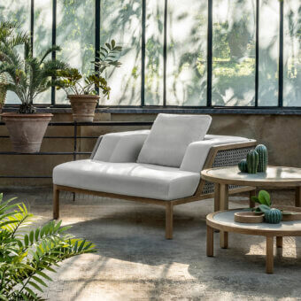 Superior Ethimo Grand Life lounge chair with warm satin-finish wood and sophisticated woven detailing inspired by Vienna straw