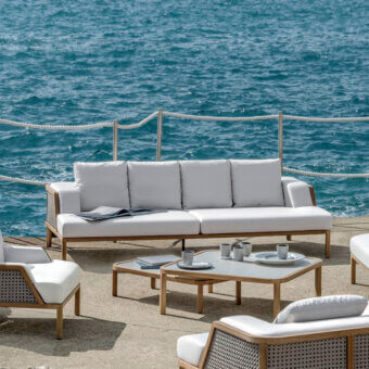 Superior Ethimo Grand Life sofa crafted in Italy with woven detail, warm wood frame and plush off-white cushioning