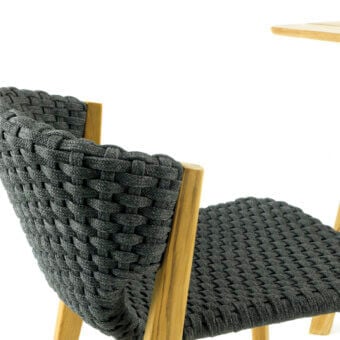 Superior Ethimo Knit chair with FSC-certified teak frame and dark charcoal gray high-density woven rope construction