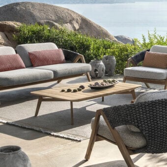 Superior Ethimo Knit coffee table crafted in FSC-certified teak with a satin finish and warm medium-toned brown wood grain