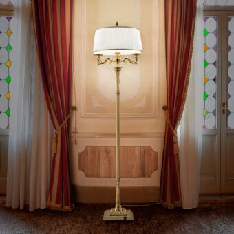Distinguished Laudarte Alya floor lamp crafted in bronze with a luminous 24K gold-plated finish and off-white pleated lampshade