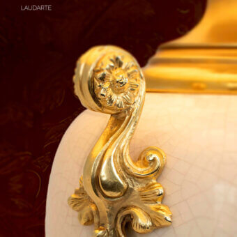Exceptional Laudarte Carsia table lamp crafted with bronze lost-wax castings, ivory porcelain, and lustrous 24K ancient gold plated finish