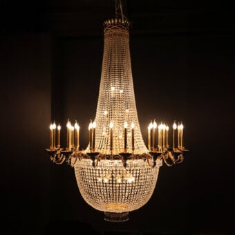 Lavish Laudarte Impero chandelier handcrafted with bronze castings, 24K gold-plated finish and brilliant Asfour crystal pendants