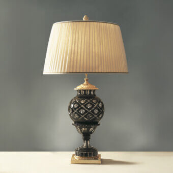 Exquisite Laudarte Tibet table lamp with crystal body, bronze castings and radiant 24K gold-plated finish in deep black and light beige