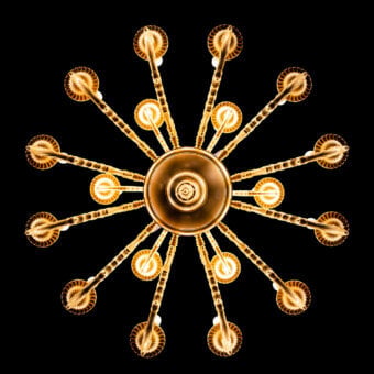 Exquisite Laudarte Venus chandelier crafted in bronze with radiant 24K ancient gold plating and floral detailing