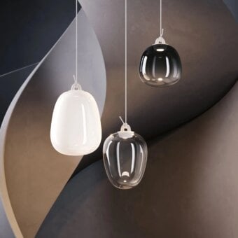 Superior Lodes Oblò Round suspension lamp crafted in transparent glossy glass with a white fabric cable
