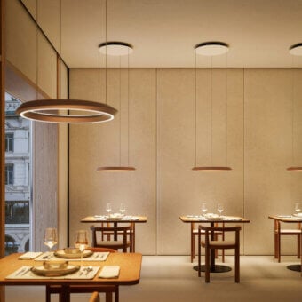 Distinguished Lodes Tidal suspension lamp crafted in satin-finish aluminum with a warm gold tone and balanced proportions