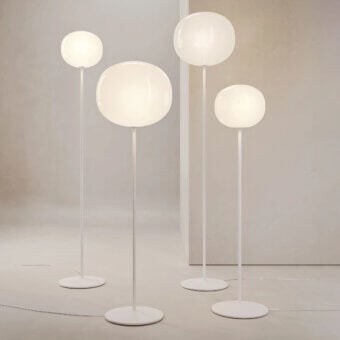 Elegant Lodes Volum floor lamp with a glossy white finish and organically shaped blown glass shade