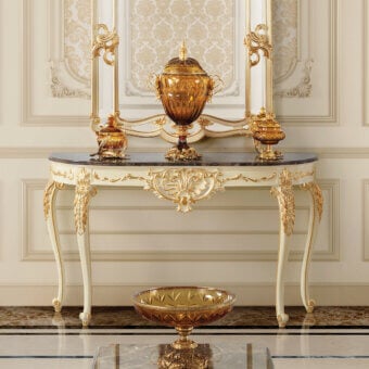 Distinguished Modenese Midnight Moon console with wood base and rich marble top in white with gold leaf detailing