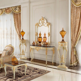 Exceptional Modenese Midnight Moon console crafted in Italy with white finish and gold leaf detailing plus marble top