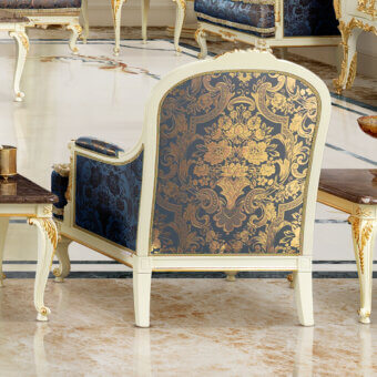 Lavish Modenese Midnight Moon lounge chair crafted in dark blue textile with gold leaf and white finish