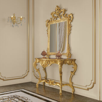 Lavish Modenese Royal Blend console crafted in Italy with ornate hand-carved details and a luxurious gold finish