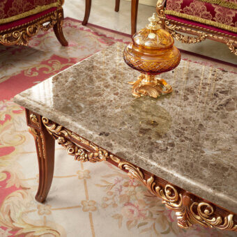 Exquisite Modenese Rubino Delight coffee table crafted with a polished marble top and solid wood in reddish-brown finish with gold-leaf carvings