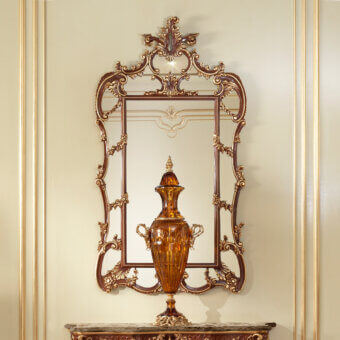 Distinguished Modenese Rubino Delight shaped mirror with reddish-brown and gold wooden frame crafted in Italy