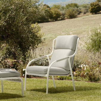 Distinguished Roberti Rattan Capri relax lounge chair with pale beige textile and powder-coated aluminum frame built with durable searope