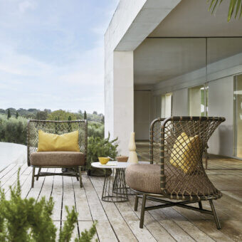 Exceptional Roberti Rattan Charme lounge chair woven with Flat Trendyrope in muted gray-brown textile with a matte finish