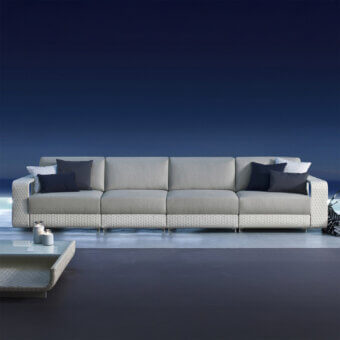 Superior Roberti Rattan Hamptons sofa crafted with aluminum, light gray Sunweave textile, and darker gray woven base