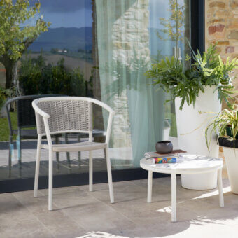Elegant Roberti Rattan Lipari armchair crafted in woven Oval Seaprope with powder-coated aluminum and gray accents