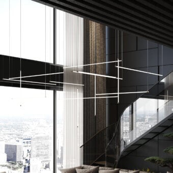Superior Stillux Line 13 suspension lamp with interconnected metal tubes and a clean white finish emitting a warm glow