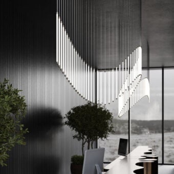 Distinguished Stillux Line 15 suspension lamp with 100 vertical metal LED tubes and a matte finish creating a sweeping silhouette