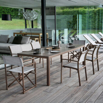 Superior Varaschin Victor table crafted in metal with a muted grayish-brown matte finish and rectangular silhouette