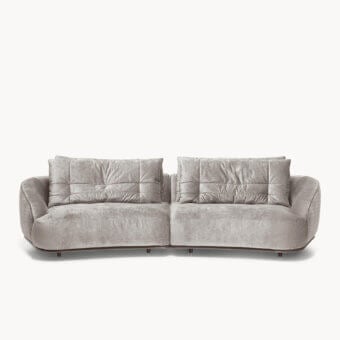 Superior Visionnaire Holden sofa with warm gray textured textile and quilted goose down cushions supported by a shaped wooden base