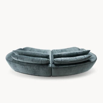 Sumptuous Visionnaire Holden sofa with muted teal textile, down-filled cushions and shaped wooden base