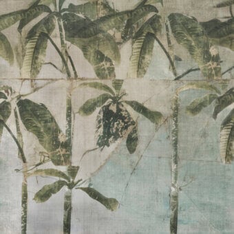 Distinguished Wall&Decò La Aldaba wallpaper with stylized banana leaf pattern in muted green and beige organic bio-vinyl and d.TW finish