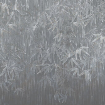 Elegant Wall&Decò Standing On wallpaper presents a contemporary bamboo forest scene in gray tones with subtle textural depth