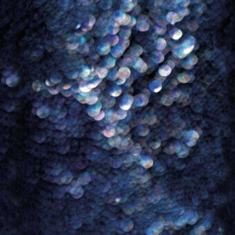 Superior Wall&Decò Thalassa wallpaper in navy and iridescent blue with textured finish and luminous depth