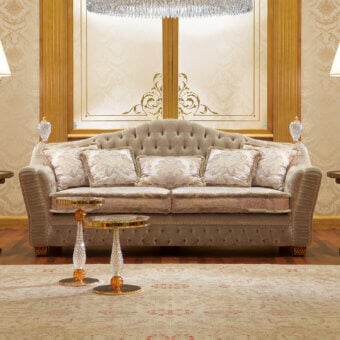 Distinguished Zanaboni Borromeo sofa with wide curved silhouette and plush muted taupe upholstery built with gold leaf legs
