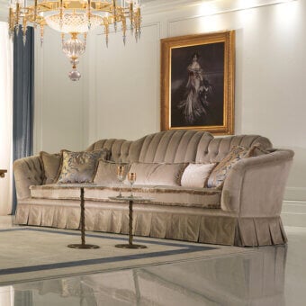 Exceptional Zanaboni Madison sofa with plush matte beige textile, traditional capitonné detailing and pleated skirt construction