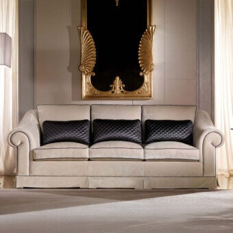 Superior Zanaboni Portofino sofa crafted in light beige textile with quilted charcoal gray back cushions and a matte finish