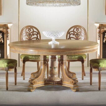 Distinguished Zanaboni T/1925 table crafted in wood with elaborately carved details and a warm medium-brown finish