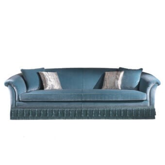 Lavish Zanaboni Theater sofa crafted in deep teal blue fabric with curled armrests and silvery-grey accents