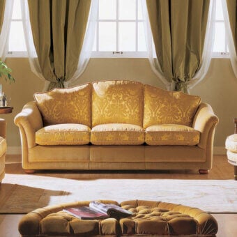 Exceptional Zanaboni Vendome sofa upholstered in golden yellow textile with button tufting and smooth finish