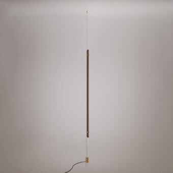 Exceptional VENICEM Optical Floor-Suspension Lamp with a steel cable and dark burnished brass supporting a trihedral amber glass element
