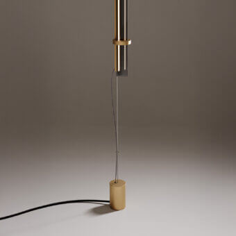 Superior VENICEM Optical Floor-Suspension Lamp with a slender steel cable and trihedral glass diffuser in burnished brass finish