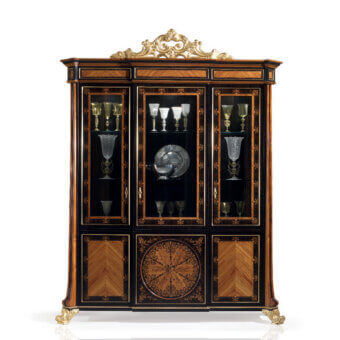 Distinguished Armando Rho A1172 cabinet crafted in bois de rose and ebony with gilded metal detailing and a glossy finish