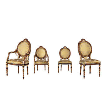 Distinguished Armando Rho 1293 chair handcrafted in wood with walnut tone and black detailing, upholstered in gold, cream, olive floral textile with gold leaf accents