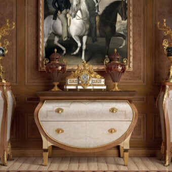 Distinguished Armando Rho A1329 dresser with warm walnut and creamy beige drawer fronts crafted with mother of pearl detailing and gilded accents
