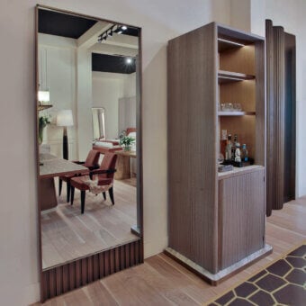 Architectural Bellavista Addams floor-standing mirror crafted in Italian poplar blockboard clad with Antique Bronze brass sheeting